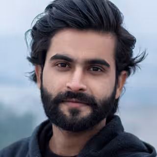 Security engineer reviewing code